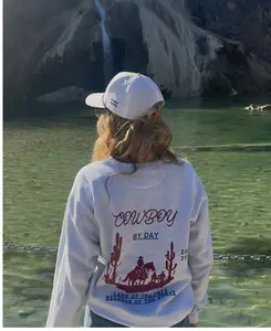 Cowboy By Day Land Of The Free Because Of The Brave Unisex garment-dyed sweatshirt