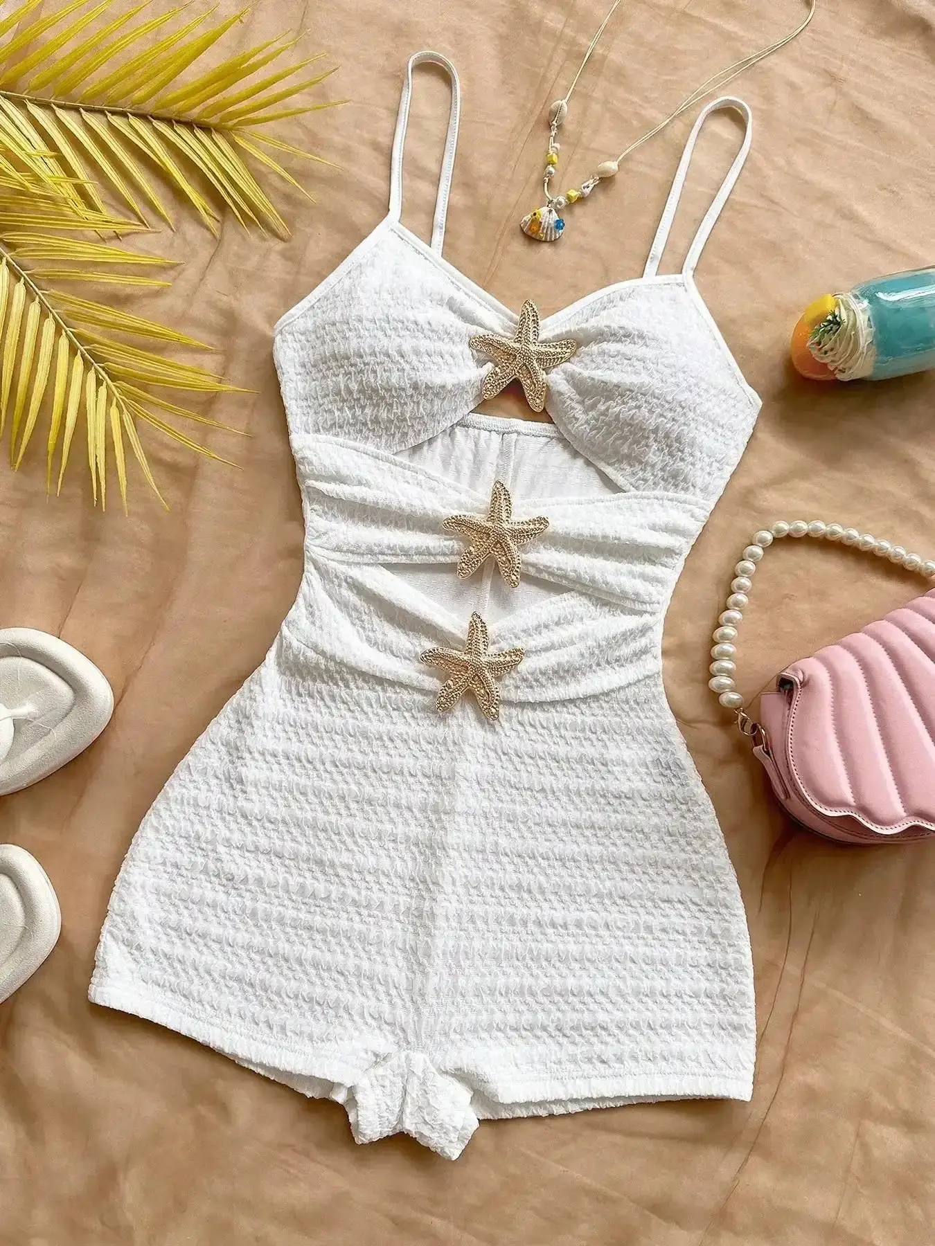 Women's Flattering Casual Hollow-Out Starfish Decor Romper Jumpsuits, Feminine Sexy Fitted Spaghetti Straps Textured Sleeveless Solid Playsuit for Beach, one-piece wonder, effortless chic, streamlined style