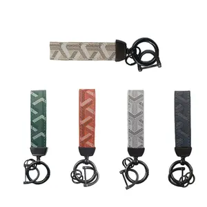Level Up Your Daily Carry. This Universal Keychain is a Durable Metal Horseshoe for Your Car Keys & a Printed Leather Lanyard for Your Phone. The Perfect Gadget Gift.