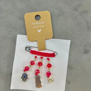 Virgencita pregnancy safety-pin