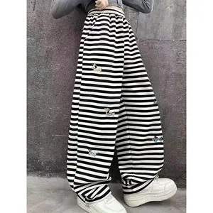 Girls' embroidered long pants with dachshund dog pattern and stripes, perfect for casual wear by girls, stylish and versatile spring and autumn pants