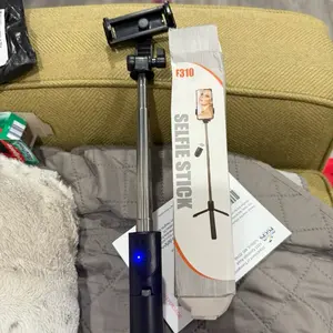 Adactador F310 Selfie Stick - Product Name and Feature Highlighted Phone