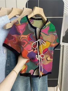 Bohemian casual vacation style loose crew neck short-sleeve knit top with colorful water ripple print, front tie design, contrast piping, khaki. Women's spring and summer knit top, summer top, spring women's wear, summer casual women's wear, khaki knit to