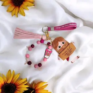 Jesus Plushie Keychain with Pink Tassel and Mystery Bracelet for Inspirational Gifts