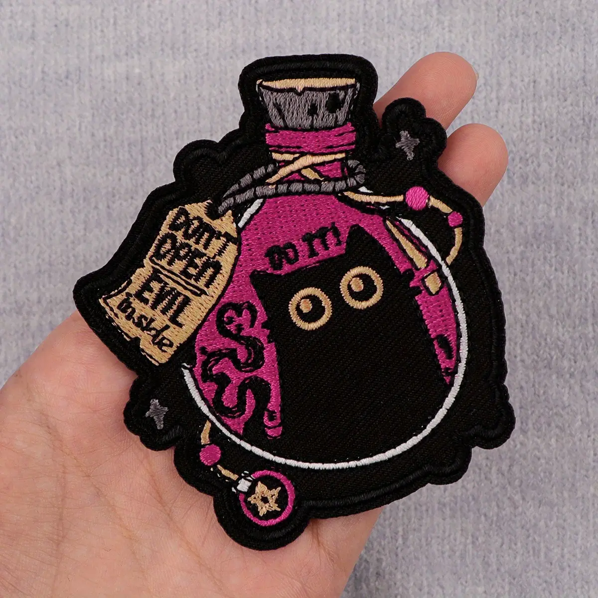 2pcs Halloween Witch Iron-On Patch - Cartoon Black Cat in Pink Potion Bottle with Stars & "Don't Open Evil" Text, Mixed Colors DIY Embroidery Applique for Clothes, Bags, Hats - Halloween Gift, Clothing Customization | Vibrant Embroidery | Durable Fabric