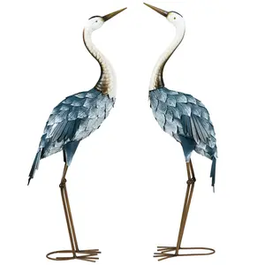 Set of 2 Crane Garden Statues – Blue. 28.5" & 29" Standing Bird Sculptures. Metal Yard Art Decor. Hand-Painted Gradient Effect. Steel w/ E-Coat & Powder Coat. Ground Stakes