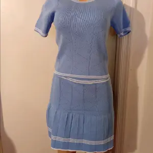 Knit skirt with Short Sleeves and Pleated Hemline