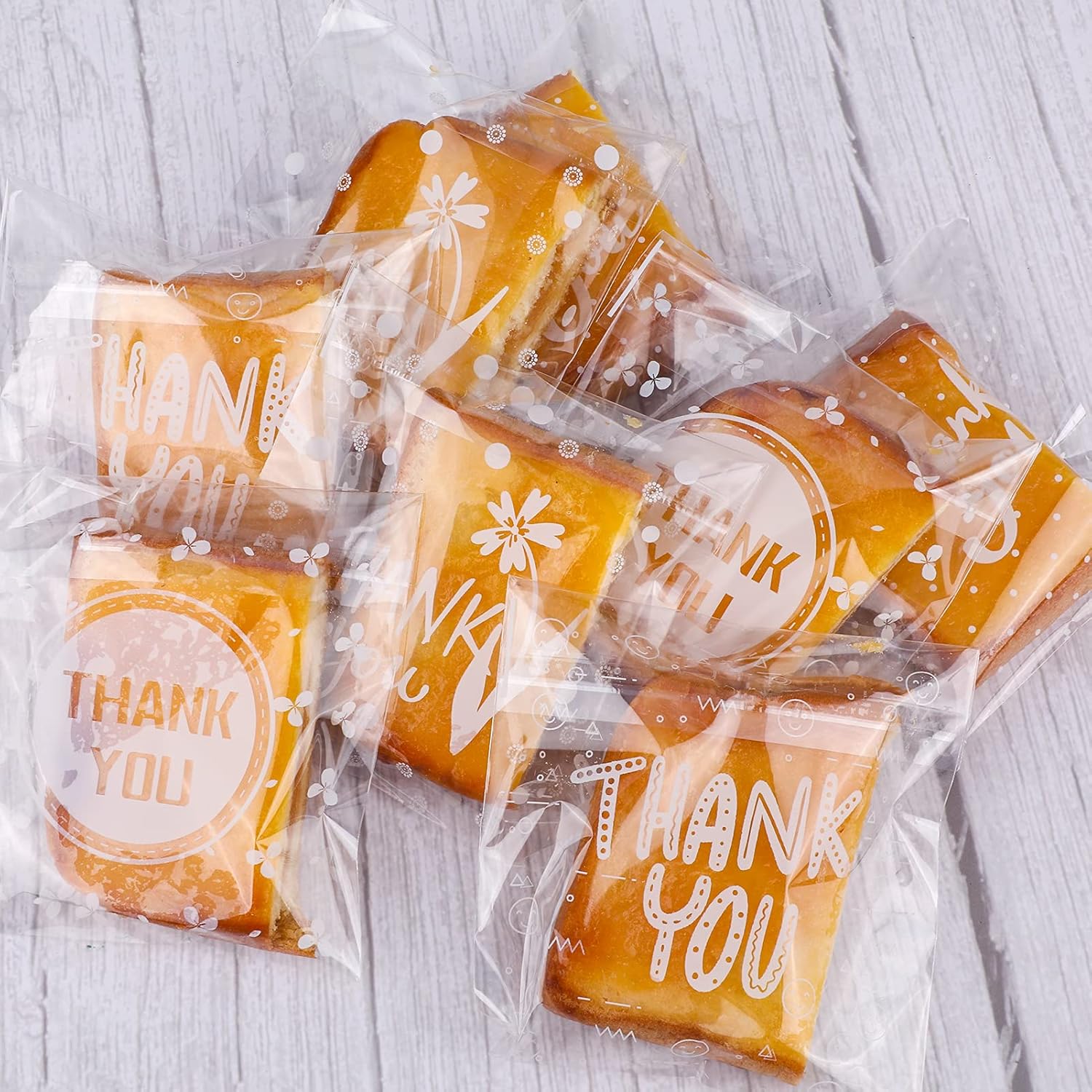 100PCS Thank You Treat Bags – Self Adhesive Cookie Candy Gift Bags, Clear Cellophane Packaging for Party Favors, Sweets & Desserts 100PCS Thank You Treat Bags – Self Adhesive Cookie Candy Gift Bags, Clear Cellophane Packaging for Party Favors, Sweets & Desserts