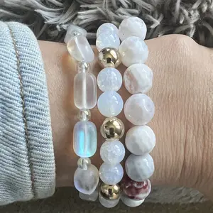 WHITE AND GOLD STACK BRACELETS