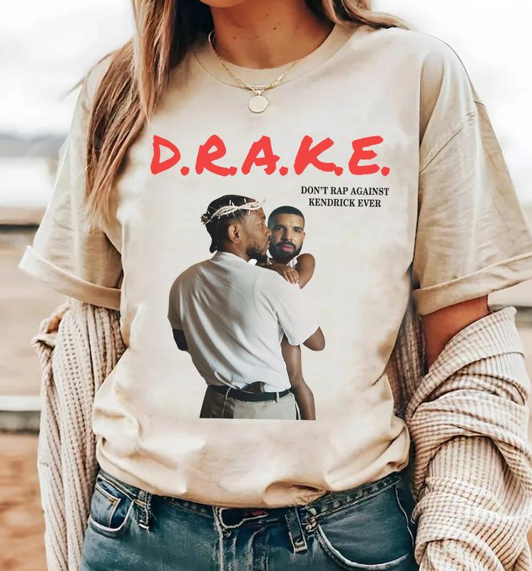 Kendrck L@mar Holding Baby Drake Unisex Cotton T-Shirt, Not Like Us, Euphoria, Meet the Grahams, Family Matters, BBL Drizzy, Liar