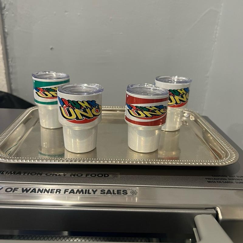 Drunk Uno with everything needed for 4 players.