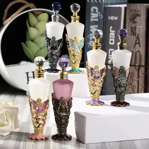 Portable 25ml Perfume Bottle: A conical, enamel-accented empty bottle designed for essential oils. Suitable for use in the study, bedroom, bathroom, or vehicle. Features frosted glass construction with an enamel metal stand, and is refillable.