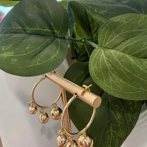 Gold Hoop Earrings with Dangling Beads for Women's Fashion Jewelry Collection