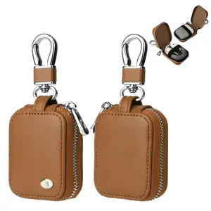 Mini PU leather earphone case with keychain, zippered earphone storage bag, waterproof and dustproof wireless earphone protective bag, suitable for travel and daily use.