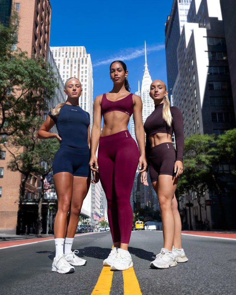 Carbon Vision Twist Front Sports Bra Medium support  Loop over spaghetti straps Sliding back straps Supportive yet soft material Removable bra pads