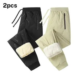 Two piece set men's warm fleece casual pants, featuring a casual sports style with thick fleece lining for warmth and comfort against the skin. The zippered pockets provide secure storage, while the cuffed design is neat and non bulky. Suitable for daily