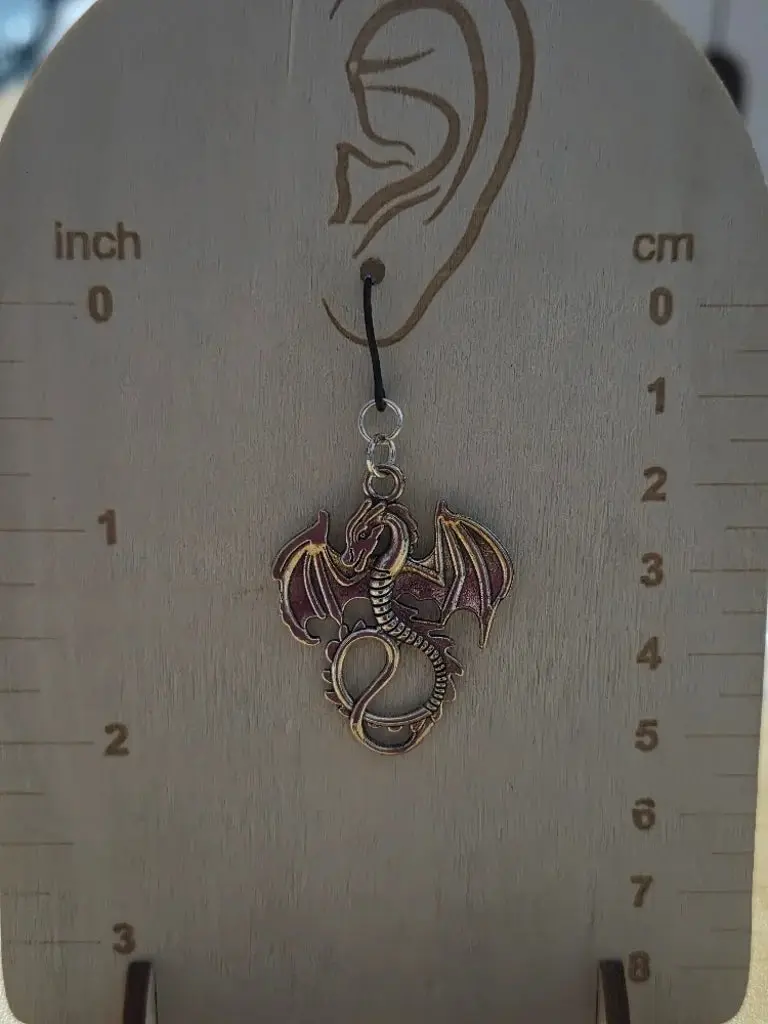 Metal dragon plastic dangly earrings