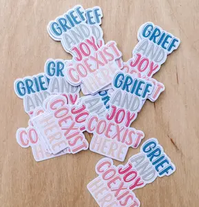 GRIEF AND JOY COEXIST HERE STICKERS
