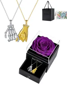 Bone Gold Pact · Symbiosis Chain Original luxury couple necklaces with real gold-plated pendants, paired with a purple preserved rose gift box. Perfect for birthdays, Mother's Day, Valentine's Day and all festive gifting.