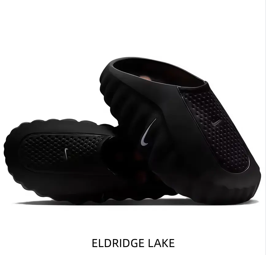 Matte Black Slip-Ons for Sports Collectibles Enthusiasts, Sculpted Foam Nodes, Perforated Upper, Sensory Street Energy, Casual Shorts Pairing, Urban Exploration-Weekend Hangs Use