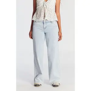 Women’s low-rise baggy jeans with button pockets, light indigo denim