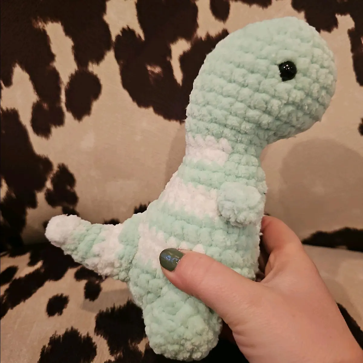 striped crochet dino