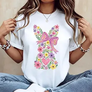 Women's Casual Round Neck Short Sleeve T-Shirt Featuring White Easter Bunny with Pink Bow and Colorful Swirls Perfect for Spring Festival and Holiday Celebrations