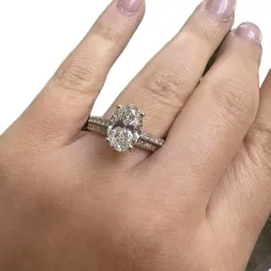 Oval Hidden Halo Diamond Ring Set 2.99 Carats VVS Clarity E–F Color Lab-Grown 14KT Gold Matching Band Ethically Grown Conflict-Free Sustainable Luxury