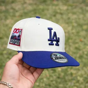 New Era 59FIFTY LA Dodgers Hat White Blue MLB Baseball Cap, High Crown Flat Brim Fitted Hat For Men & Women, 3D Embroidered LA Logo, Anniversary Side Patch Detail, Urban Streetwear Style Premium Collector Edition Snapback Option