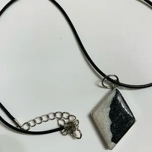 Black and White Resin Triangle Necklace on a 20 in cord