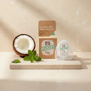 Dr. Ginger's Organic Coconut Expanding Floss 32 Yards with Coconut Oil & White Charcoal,  Helps remove visible plaque on teethWhitening, Anti-Cavity, Oral Comfort