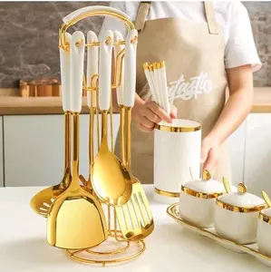 Stainless Steel Kitchenware Seven Pieces Set White Gold Cooking Utensils 7 Pcs with Hanging Shelf Includes Slotted Spoon Spatula Large Spoon Soup Ladle Spatula Pasta Spoon