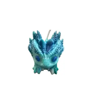 Baby dragon candle
