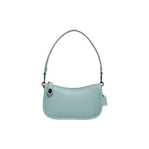 COACH Swinger 20 Leather Crossbody Bag in Mint Green for Women