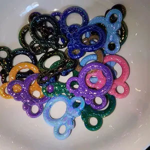 Beadable pen spinners