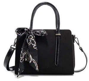 LA TERRE  An exquisite handbag with chain detailing and a scarf accent, perfect for everyday stylish use.