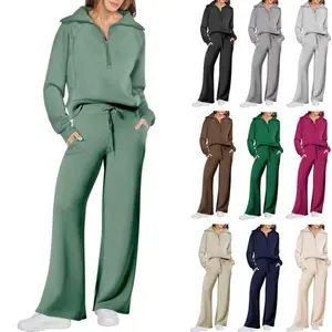 Women's casual two-piece sports suit with half zipper pullover sweatshirt and wide leg pants, paired with drawstring matching top and sweatpants, providing daily comfort and a simple styleRAIMENTRY