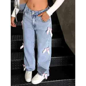 Fashionable stone washed loose denim straight leg pants, bow tie decorative pockets, seasonal clothing, Christmas partiesRAIMENTRY