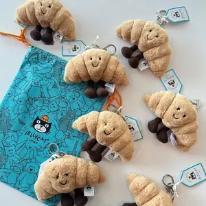 Jellycat Amuseables Croissant Bag Charm – Cute Stuffed Animal Bag Charms and Keyrings for Women Kids Teens, Adorable Gift Idea for Birthdays and Holidays