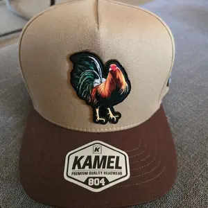 Gorra gallo ,color cafe marca kamel  ajustable