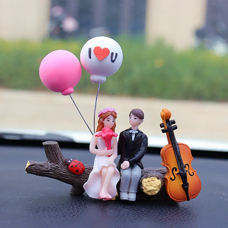 Newlywed couple balloon on a tree branch