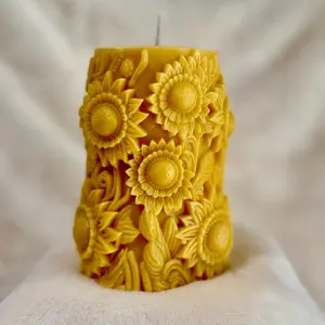 Golden River Oshun's Blessing - Yellow Decorative Candle with Sunflower Design and Intricate Carvings