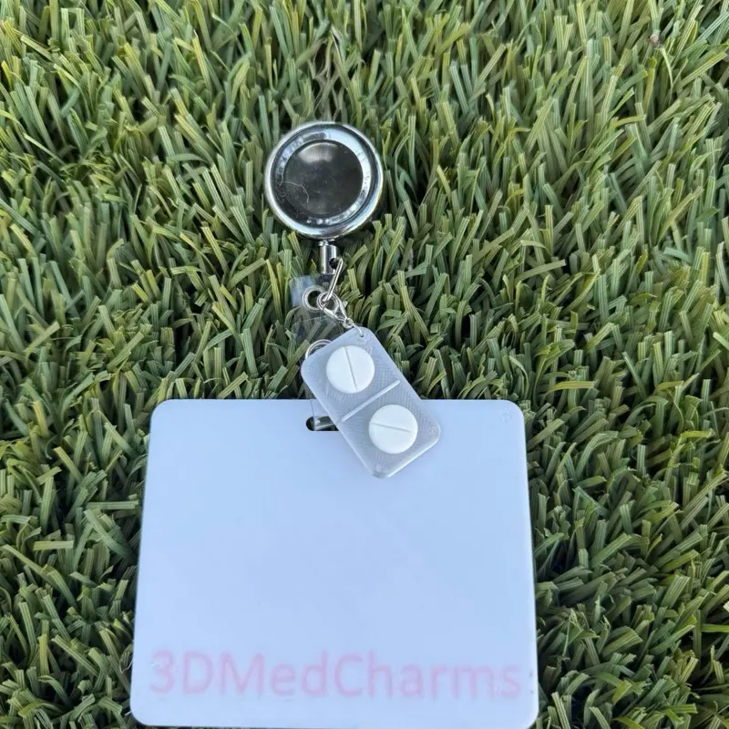 Pill badge keychain