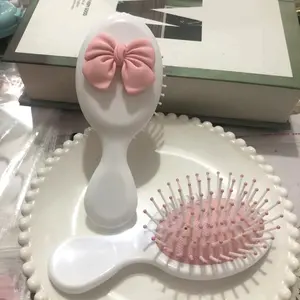 1 Bow Mini Comb - Portable Comb with Airbag, ABS Plastic Handle and Mane for Normal Hair Trimming, Massage Comb with Pink Bow Design, Hairstyling Tool Brushes