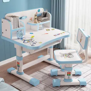 summervibes Kids Functional Desk and Chair Set, Height Adjustable Children School Study Table Chair Set with Cartoon Pattern, Ergonomic Desk Chair with Large Writing Board, Bookshelf and Book Bucket (Pink, Blue)