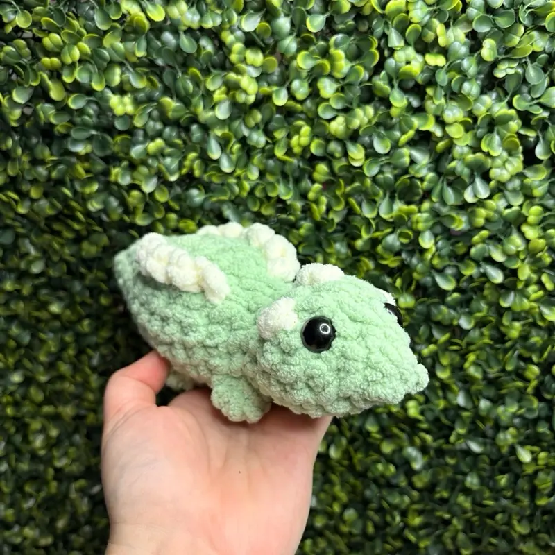 Handmade Light Green Amigurumi Crochet Stegosaurus Plush - Soft Yarn Stuffed Dinosaur, Cute DIY Knitting Gift for Kids