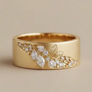 An elegant 18K gold-plated leaf-shaped ring adorned with Zirconia stones, a fashionable and versatile engagement ring for women.