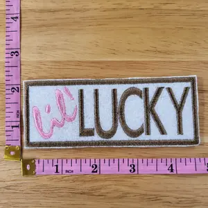 Lil' Lucky iron on embroidered patch set of 6. Triple 7s, flaming dice, eight ball, horseshoes, money bag, and Lil' Lucky patches. embroidery