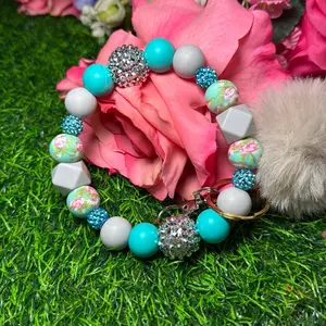 True bloom wristlet keychain color scheme turquoise, gray, floral print and  bling beads Made with wire