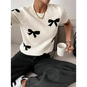 Women’s color-block knit sweater with a bow detail and crew neck, casual short-sleeve spring crewneck pullover, fashionable everyday knitwear for women GARMENTARY